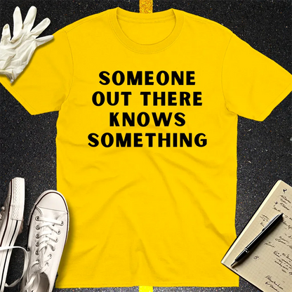 Someone Knows Something T-Shirt - Daisy