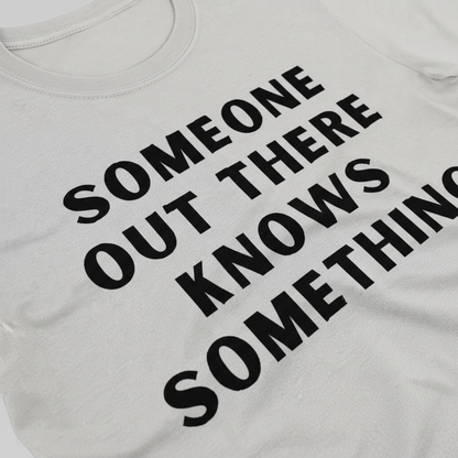 Someone Knows Something T-Shirt__detail