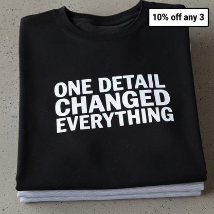 One Detail Changed Everything T-Shirt_stacked_flatlay